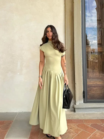 Vestido plisado verde elegante